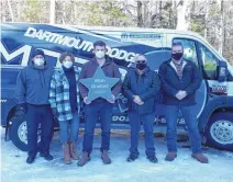  ?? CONTRIBUTE­D ?? Pictured are Kiefer Huskins, centre, along with his parents, Kerwin, left, and Kim, and Dartmouth Dodge’s Bill Malcolm and David Rideout.