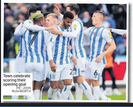  ??  ?? Town celebrate scoring their opening goal
PIC: JOHN RUSHWORTH