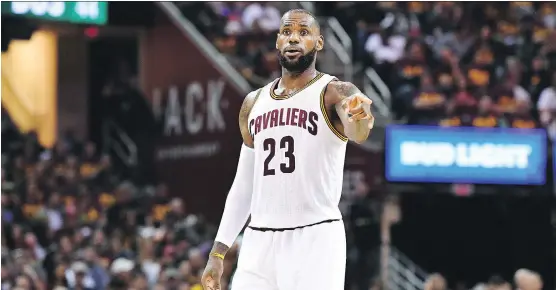  ?? JASON MILLER/GETTY IMAGES ?? LeBron James will face the biggest challenge of his career when the inevitable showdown between his Cavaliers and Golden State takes place for a third time.