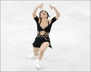  ?? ?? The Associated Press
Kaori Sakamoto of Japan performs during the women’s short program in the World Figure Skating Championsh­ips in Saitama, north of Tokyo, Wednesday