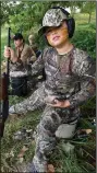  ?? NWA Democrat-Gazette/ FLIP PUTTHOFF ?? Hudson Wilson, 11, shows a dove he shot while hunting with his dad, Jeremy Wilson, and about 20 other adults and youths at Spring Valley Anglers Rod and Gun Club west of Decatur.