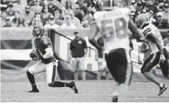  ?? KENNETH K. LAM/BALTIMORE SUN ?? The Ravens’ Devin Hester takes a knee against the Browns on Sunday, a move the NFL’s new rule on kickoff returns was intended to encourage.