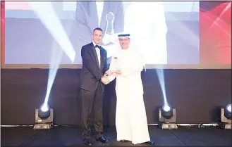  ??  ?? Ahmed Al-Kharji receiving the award.