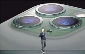  ?? APPLE ?? CEO Tim Cook introduces the iPhone 11 Pro in September.