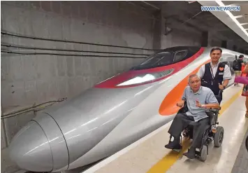  ?? Photo: Xinhua ?? Passengers with train G5736 at West Kowloon Station in Hong Kong, south China, on September 23, 2018. The train left Hong Kong West Kowloon Station at 7:00am yesterday for Shenzhen North Railway Station.