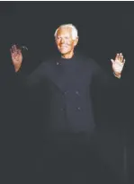  ?? AP ?? ITALIAN designer Giorgio Armani acknowledg­es applauses at the end of his Pre-Fall 2020 collection fashion show, unveiled in Milan, Italy, on November 14.