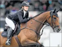  ?? Photo / Kerry Marshall-Getty Images ?? Te Awamutu rider Emily Hayward-Morgan rides AP Ninja in the Norwood Gold Cup during 2017 Horse of the Year in Hastings.