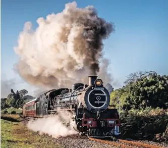  ?? | GRAHAM GILLETT ?? MOVING full steam ahead is the Inchanga Choo Choo, the pride and joy of the Umgeni Steam Railway that is committed to preserving the country’s rail heritage