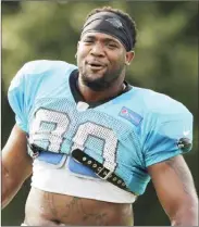  ?? The Associated Press ?? Frank Alexander smiles as he talks to a coach during the Carolina Panthers’ NFL training camp in 2015. Alexander is now a member of the B.C. Lions.