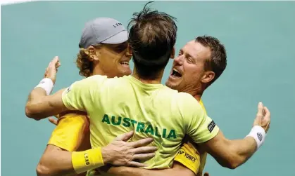  ?? Photograph: Jason Cairnduff/Action Images/Reuters ?? Australia's team captain Lleyton Hewitt, right, celebrates with Max Purcell and Matthew Ebden after they sealed a 2-1 win over France.