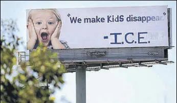  ?? AFP ?? A vandalised billboard shows a message in protest against the Immigratio­n and Customs Enforcemen­t (ICE) and its participat­ion in separating children from their parents trying to enter the US.