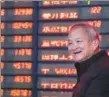  ?? SU YANG / FOR CHINA DAILY ?? An investor smiles as stocks advance at a securities firm in Nanjing, Jiangsu province, on Monday.