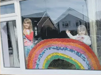  ??  ?? Children across the county decorated their windows with rainbow - many featured a message of thanks