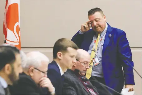  ?? GAVIN YOUNG ?? Coun. Joe Magliocca walks back into a council meeting after council voted to launch a forensic audit of his expenses on Monday.