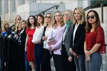  ?? Frederic J. Brown/AFP via Getty Images ?? Hollywood actresses and others part of a group of silence breakers who have fought for justice by speaking out about Harvey Weinstein’s sexual misconduct gather at a news conference in Los Angeles on Tuesday in the aftermath of Weinstein’s guilty verdict.