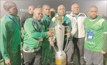  ?? (Pic: Mengameli Mabuza) ?? Green Mamba Head Coach Ernest Mavuso (3rd R) is expected to smile all the way to the bank after steering his side to Ingwenyama Cup glory.