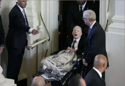  ?? Andrew Harnik/Associated Press ?? Former President Jimmy Carter arrives to attend a tribute service for his wife and former first lady Rosalynn Carter on Tuesday at Glenn Memorial Church in Atlanta.