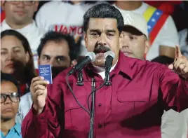  ?? FOTO: TT-AP/ARIANA CUBILLOS ?? – Vi är historiens kraft omvandlad i folklig seger, permanent folklig seger, framhöll Nicolás Maduro i sitt segertal.