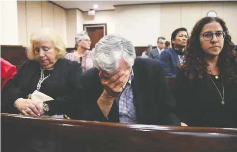  ?? ALICIA DEVINE / TALLAHASSE­E DEMOCRAT VIA THE ASSOCIATED PRESS ?? Phil Markel, father of slain professor Dan Markel, is overcome with emotion Friday in Tallahasse­e, Fla., as the guilty verdict is read for Sigfredo Garcia.