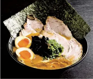  ?? ATSUSHI FUJIWARA RAMEN KING KEISUKE ?? A lobster broth ramen bowl from Ramen King Keisuke, a Singapore-based restaurant chain that is opening its first San Diego location this spring.