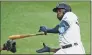  ?? Chris O’Meara / Associated Press ?? The Tampa Bay Rays’ Randy Arozarena drops his bat as he ducks away from an inside pitch by the New York Yankees’ Corey Kluber during the third inning on Friday.