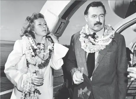  ?? HULTON ARCHIVE/GETTY IMAGES ?? Martha Gellhorn, left, with Ernest Hemingway circa 1941. Theirs was a marriage troubled by his competitiv­e nature.