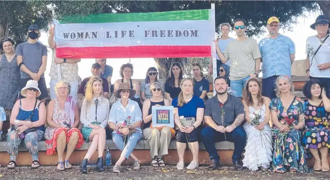  ?? Picture: Supplied ?? Community members gathered in Townsville on Saturday to show their support for the people of Iran.