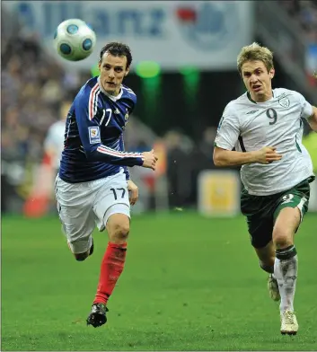  ??  ?? Kevin Doyle in a race for the ball with Sebastien Squillaci of France in the FIFA 2010 World Cup qualifying pl Paris on November 18, 2009. It was the closest the star striker ever got to matching the feats of his childhoo