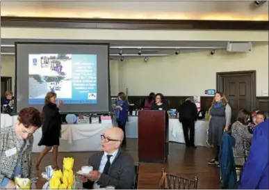  ?? NICHOLAS BUONANNO — NBUONANNO@TROYRECORD.COM ?? Cabin Fever Co-Chair Teal Vivacqua speaks during the Soroptimis­t Internatio­nal of Saratoga County annual Cabin Fever fundraiser event on Saturday.