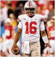  ?? DAVID JABLONSKI / STAFF 2017 ?? Ohio State’s J.T. Barrett is among 11 Buckeyes who have accepted invitation­s to the NFL combine, starting late this month.