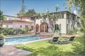  ?? Jonathan Bishop Shawn Bishop Photograph­y ?? WALLACE NEFF was the architect of the 1927 house that television’s Johnny Mountain has listed for $3.749 million.