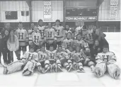  ??  ?? Coach Dean Diamond (back row left) and his Housatonic co-op ice hockey team last year.