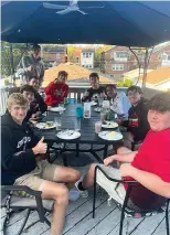  ?? ?? During warmer months, the breakfast club eats outside. (Courtesy of Peggy Winckowski)