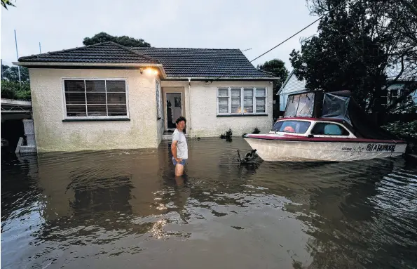  ?? PHOTO: THE NEW ZEALAND HERALD ?? Unexpected . . . Analysts say flooding in Auckland has increased the likelihood of insurance companies exceeding their catastroph­e budgets.
