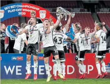  ?? Picture: ACTION IMAGES VIA REUTERS/MATTHEW CHILDS ?? TOP FLIGHT: Tom Cairney and Aleksandar Mitrovic of Fulham celebrate winning promotion back to the Premier League when they beat Brentford at Wembley Stadium.