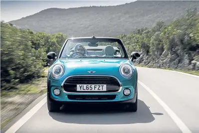  ??  ?? The third generation Mini Convertibl­e is more spacious and has a clever roof system.