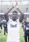  ?? DARRYL DYCK, THE CANADIAN PRESS ?? Whitecaps midfielder Alphonso Davies scored two goals on Sunday against the Timbers.