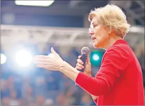  ??  ?? Sen. Elizabeth Warren speaks to a crowd during a campaign stop in December in Oklahoma City. [DOUG HOKE/ THE OKLAHOMAN]