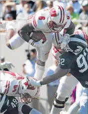  ?? Al Goldis ?? WISCONSIN’S Corey Clement came up short on this dive for the end zone, but he scored on the next play.