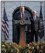  ?? AP/EVAN VUCCI ?? President Donald Trump, with Vice President Mike Pence at his side Friday at the White House, predicted that growth for all of 2018 would be the best in 13 years, a view most economists don’t share.