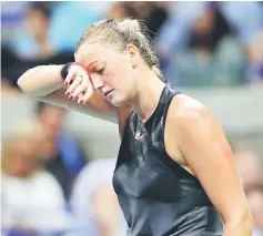  ??  ?? Kvitova reacts during her women’s singles against Venus. — AFP photo