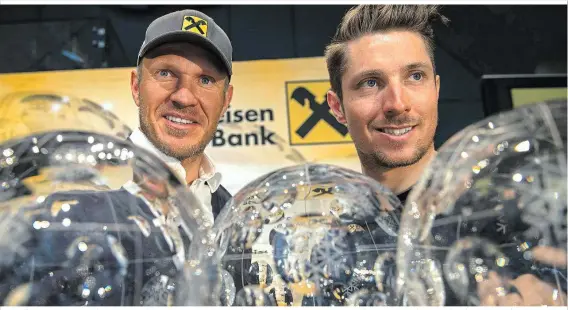  ??  ?? Rot-weiß-rote Legenden: Zumindest als prominente Werbeträge­r werden die Salzburger Landsleute Hermann Maier und Marcel Hirscher weiterhin zu sehen sein WM in Tokio.