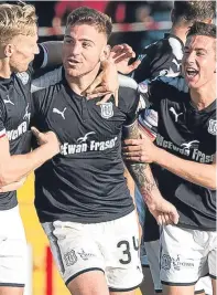  ?? Pictures: SNS. ?? Clockwise from main picture: Scott Bain makes a trademark block against Kilmarnock; the keeper during the draw against Hibs; and Kerr Waddell celebrates his winner against Hearts a fortnight ago.