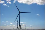  ?? BLOOMBERG ?? A federal auction for rights to develop wind farms off the coast of Long Island resulted in a bidding war.