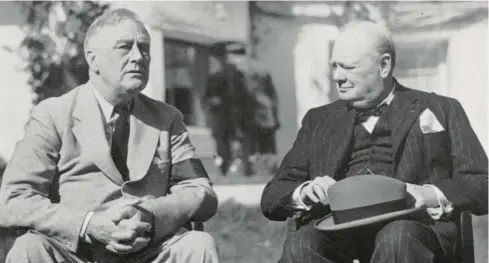  ?? AP 1943 ?? President Franklin D. Roosevelt sits with his close friend, British Prime Minister Winston Churchill, during the Casablanca Conference in Morocco.