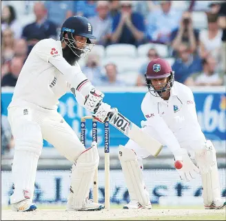  ??  ?? England’s Moeen Ali bats on the fourth day of the second internatio­nal Test match between England and the WestIndies at Headingley cricket ground in Leeds, northern England on Aug 28. (AFP)