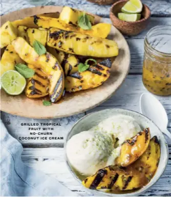  ??  ?? GRILLED TROPICAL FRUIT WITH NO-CHURN COCONUT ICE CREAM