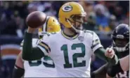  ?? NAM Y. HUH - THE ASSOCIATED PRESS ?? Green Bay Packers quarterbac­k Aaron Rodgers (12) throws a pass during the first half of an NFL football game against the Chicago Bears Sunday, Dec. 16, 2018, in Chicago.
