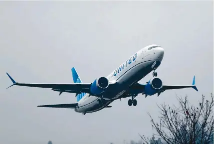  ?? Ted S. Warren, Associated Press file ?? A United Airlines Boeing 737 Max jet takes off in the rain at Renton Municipal Airport in Renton, Wash. United announced Friday that it’s removing Max jets from its schedule until early September, forcing it to cancel more flights. Max jets have been grounded worldwide after two crashes, in late 2018 and early 2019, killed a total of 346 people.