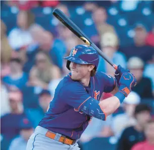  ?? LYNNE SLADKY/AP PHOTOS ?? Mets’ Brett Baty bats during the second inning of a March 16 spring training game against the Nationals in West Palm Beach, Fla.